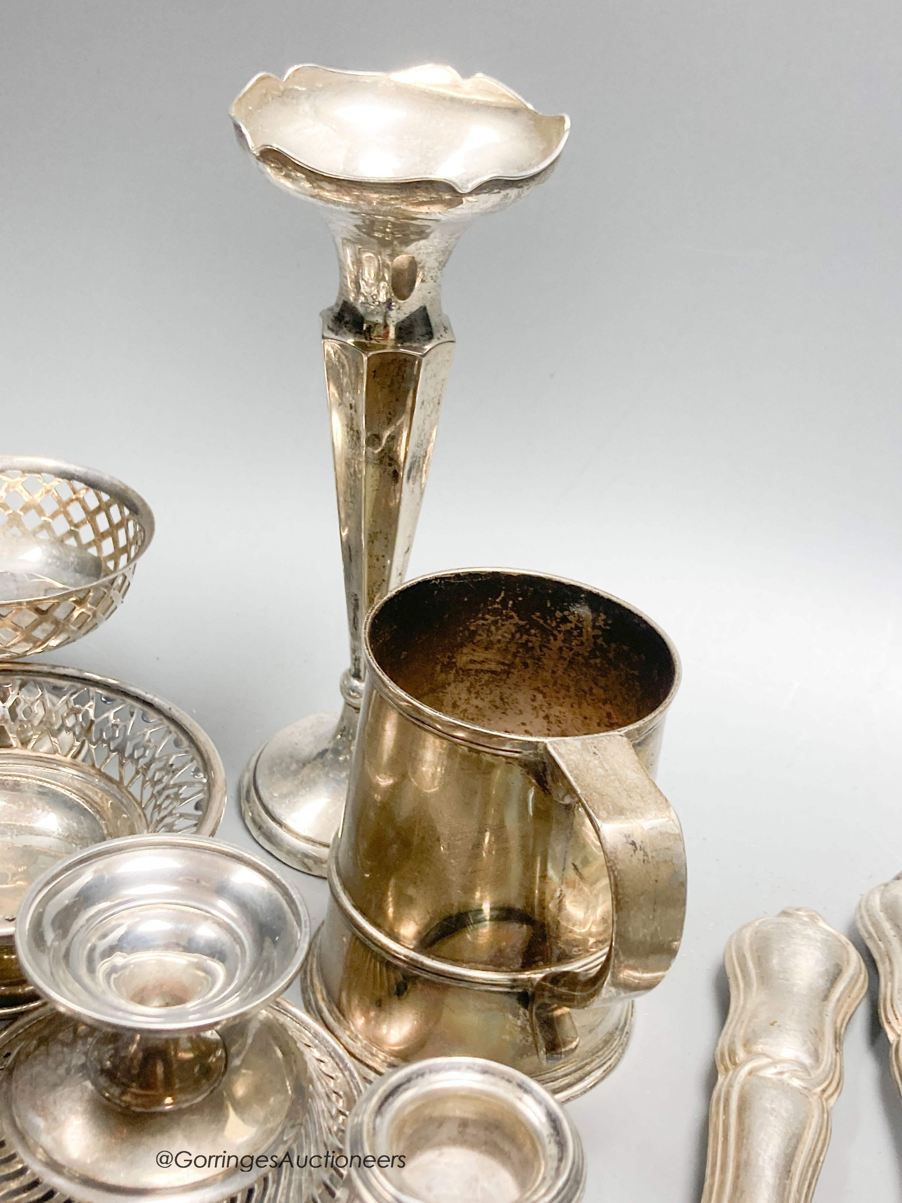 A group of assorted small silver etc. including two pairs of nit dishes, christening mug, spill vase, chamberstick, pair of dwarf candlesticks, pedestal dish, carving set and cased textured cup